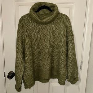 Cable knit turtle knit sweater.